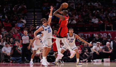 Houston Rockets forward Kevin Durant (7) shoots against Orlando Magic forward Franz Wagner (22) and forward Tristan da Silva (23) during the first half of an NBA basketball game in Houston, Sunday, Nov. 16, 2025. (AP Photo/Ashley Landis)