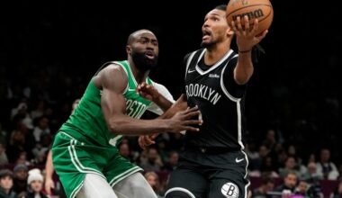 Celtics win ugly over lowly Nets to climb above .500 for first time