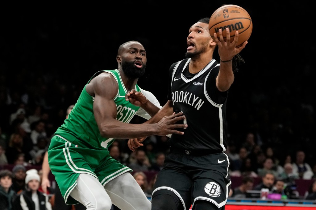 Celtics win ugly over lowly Nets to climb above .500 for first time