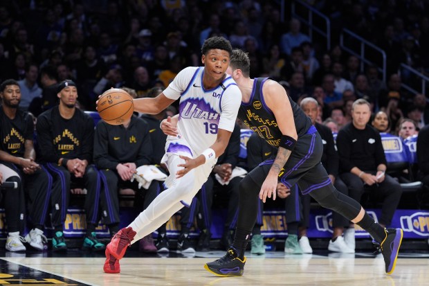 Utah Jazz rookie guard Ace Bailey drives as Lakers guard...