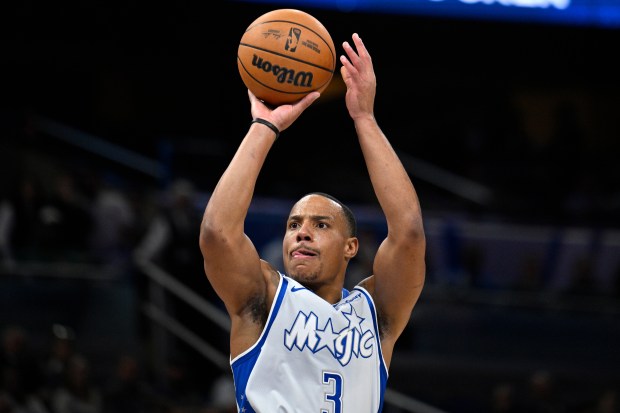 Orlando Magic guard Desmond Bane (3) goes up to shoot...