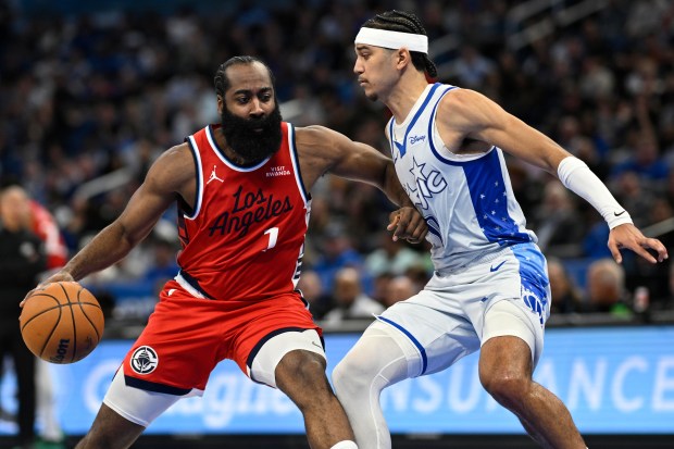 Clippers star James Harden handles the ball as Orlando Magic...