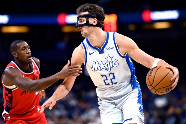 Orlando Magic forward Franz Wagner drives as Clippers guard Kris...