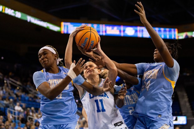 UCLA forward Gabriela Jaquez (11) is defended by Southern during...