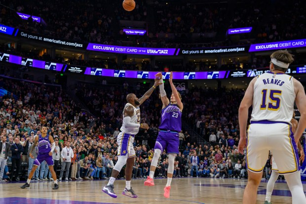 Utah Jazz forward Lauri Markkanen (23) shoots the ball over...
