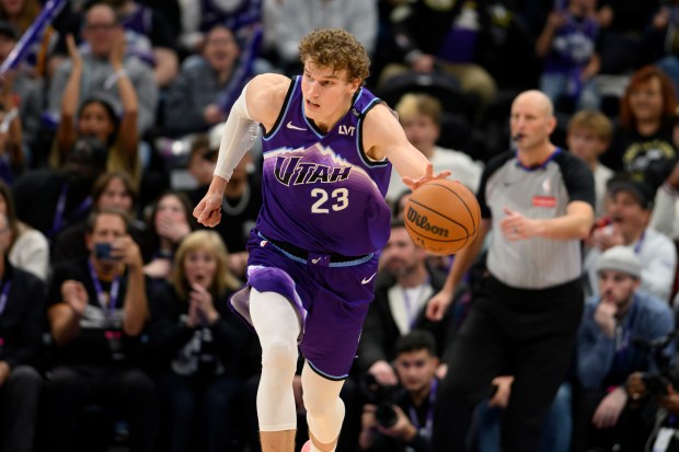 Utah Jazz forward Lauri Markkanen brings the ball up court...