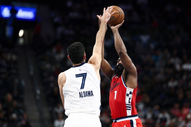 Clippers guard James Harden (1) shoots against Memphis Grizzlies forward...