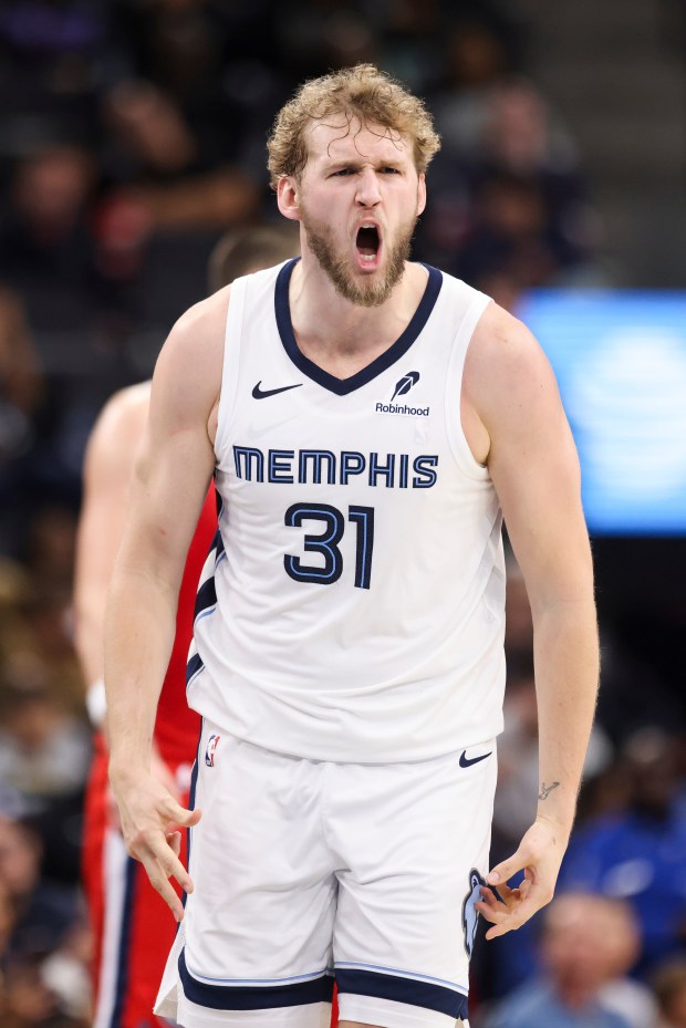 Memphis Grizzlies center Jock Landale (31) reacts after making a...