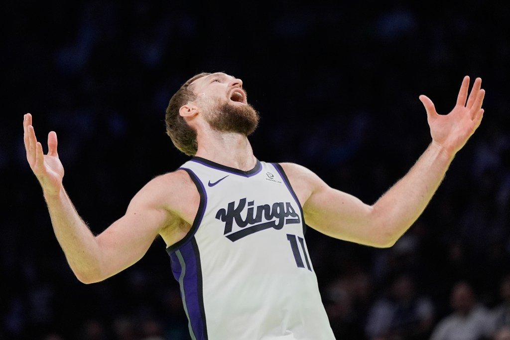 Sacramento Kings forward Domantas Sabonis (11) reacts after missing a shot during the second half of an NBA cup basketball game against the Minnesota Timberwolves, Friday, Nov. 14, 2025, in Minneapolis. 