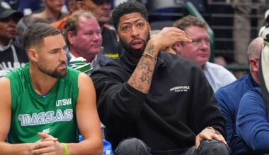 Dallas Mavericks forward Anthony Davis, right, sits on the bench with teammate Dallas Klay Thompson during the first half of an NBA basketball game against the Milwaukee Bucks in Dallas, Monday, Nov. 10, 2025. (AP Photo/LM Otero)