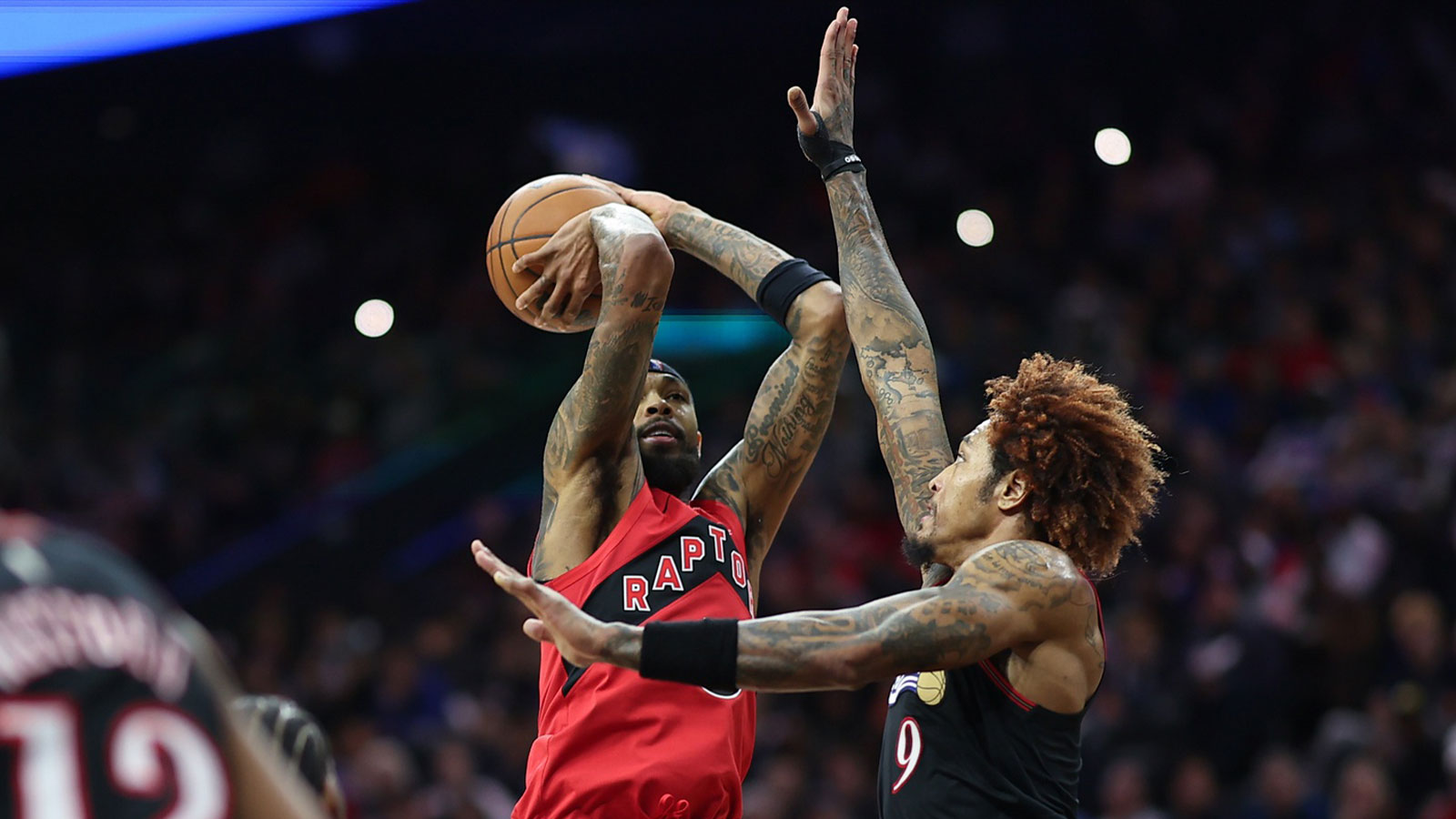 Toronto Raptors forward Brandon Ingram (3) shoots in front of Philadelphia 76ers guard Kelly Oubre Jr. (9) during the third quarter at Xfinity Mobile Arena.