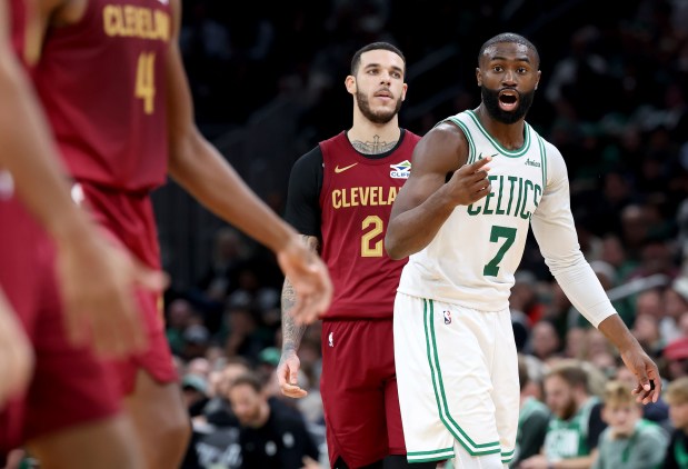 Boston Celtics guard Jaylen Brown (7) reacts after a foul was called against him during the second half of an NBA basketball game against the Cleveland Cavaliers, Wednesday, in Boston. (Mark Stockwell/Boston Herald)