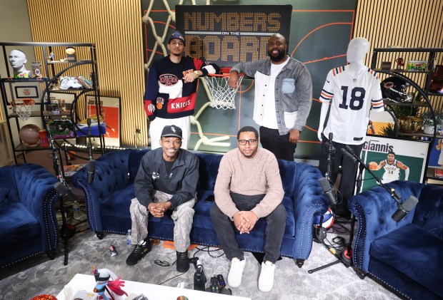 Pierre Andresen and Darrick Miller, top, from left, and Kenny Beecham and Michael Heard, bottom, from left, pose for a portrait after filming an episode of "Numbers on the Board" at Enjoy Basketball in Oak Brook on Tuesday, Nov. 11, 2025. (Talia Sprague/for the Chicago Tribune)