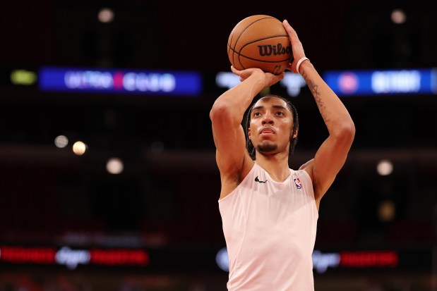 Bulls forward Noa Essengue warms up before a game against the Pistons on Oct. 22, 2025, at the United Center. (Michael Reaves/Getty Images)