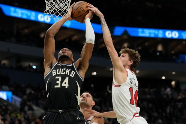 Bucks forward Giannis Antetokounmpo shoots against Bulls forward Matas Buzelis on Nov. 7, 2025, at Fiserv Forum in Milwaukee. (Patrick McDermott/Getty Images)