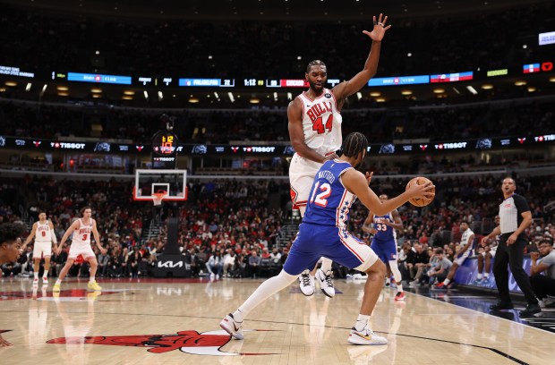 Chicago Bulls forward Patrick Williams (44) tries to block the pass of Philadelphia 76ers guard/forward Trendon Watford (12) in the first half of a game at the United Center in Chicago on Nov. 4, 2025. (Chris Sweda/Chicago Tribune)