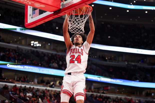 Chicago Bulls forward Noa Essengue (24) dunks the ball during the fourth quarter against the Minnesota Timberwolves at the United Center Thursday Oct. 16, 2025, in Chicago. (Armando L. Sanchez/Chicago Tribune)