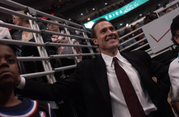 New GM John Paxson watches a game against the 76ers...