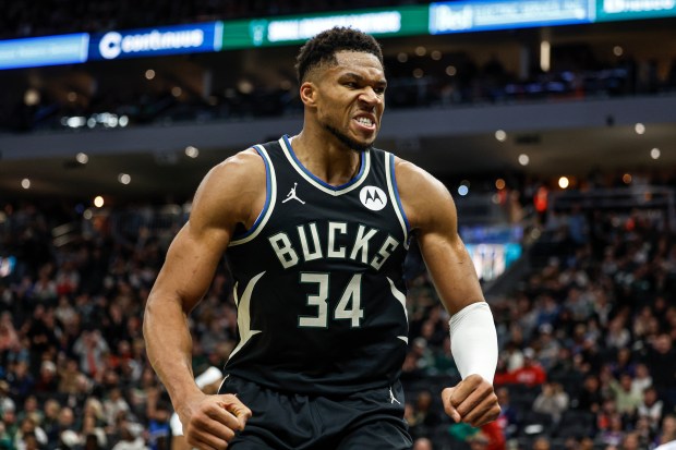 Bucks forward Giannis Antetokounmpo flexes after scoring a basket against the Bulls during the second half of an NBA Cup game Friday, Nov. 7, 2025, in Milwaukee. (Jeffrey Phelps/AP)