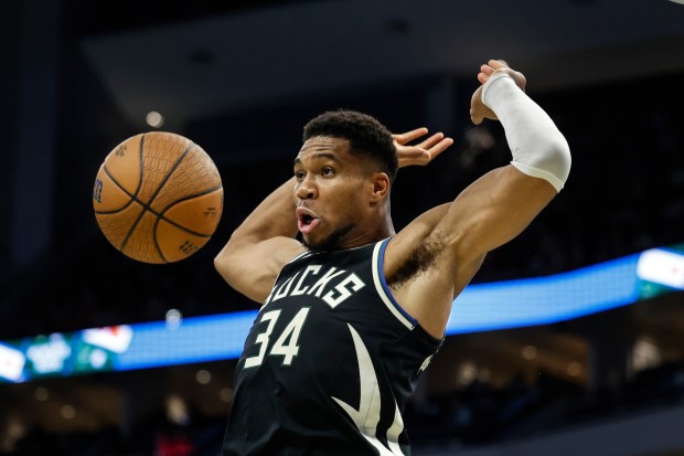 Bucks forward Giannis Antetokounmpo reacts after dunking against the Bulls during the second half of an NBA Cup game Friday, Nov. 7, 2025, in Milwaukee. (Jeffrey Phelps/AP)