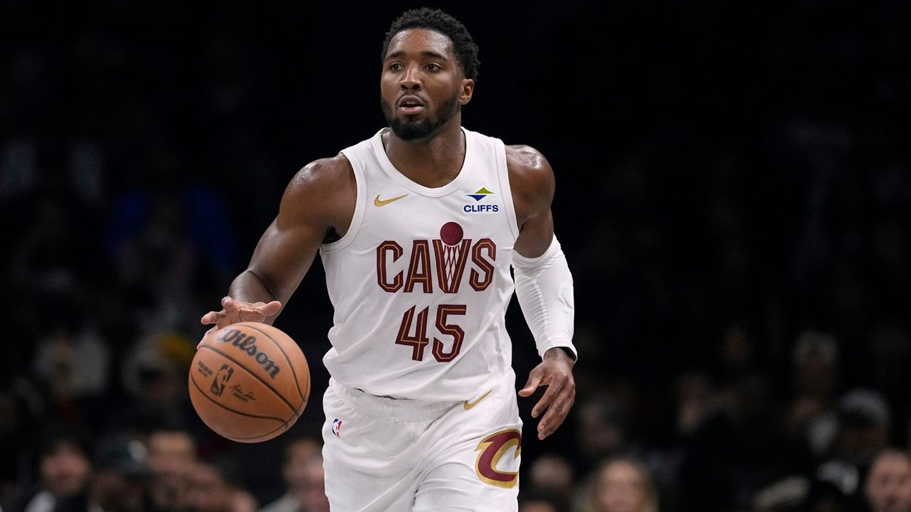 Cleveland Cavaliers' Donovan Mitchell (45) looks to pass during the first half of an NBA basketball game against the Brooklyn Nets Friday, Oct. 24, 2025, at Barclays Center in New York. (AP Photo/Frank Franklin II)