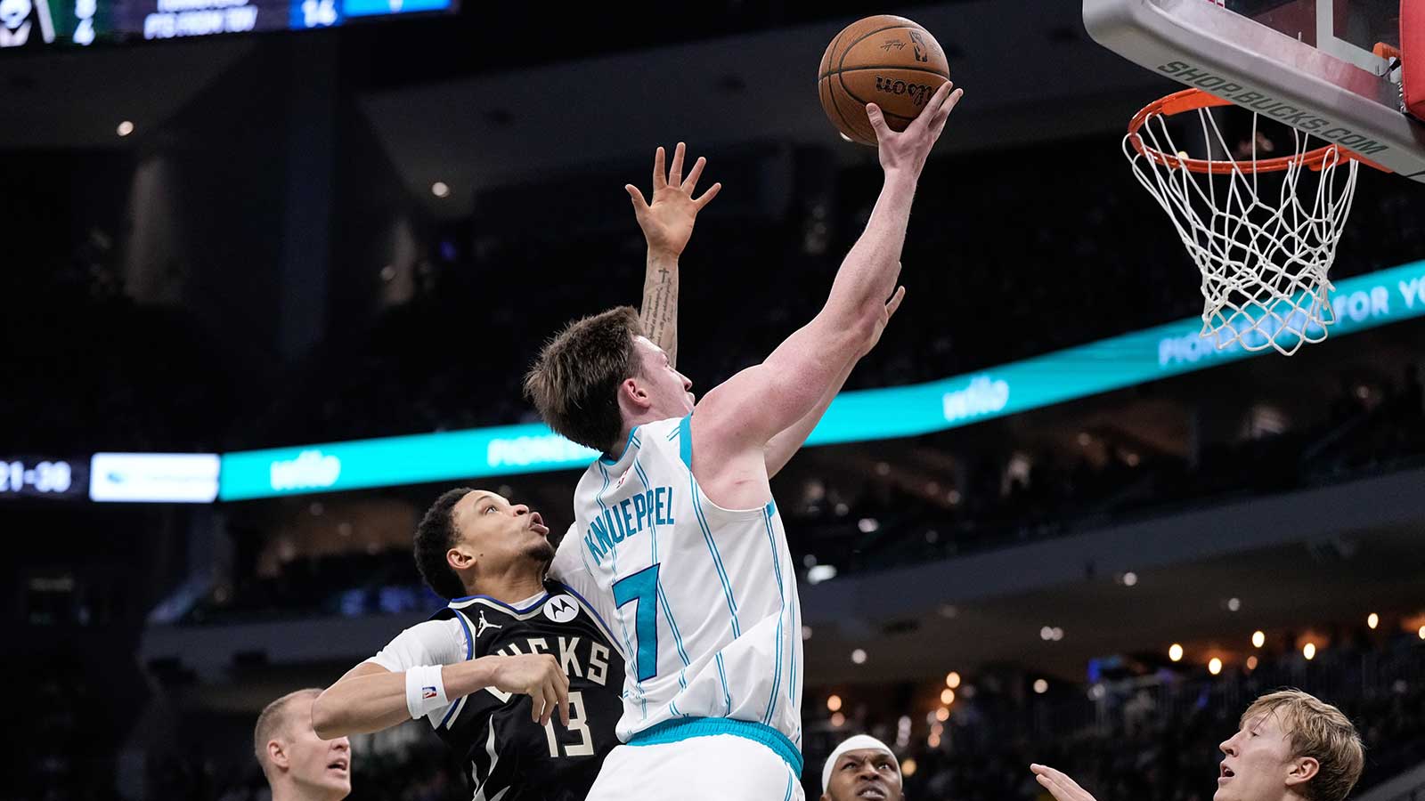 Charlotte Hornets guard Kon Knueppel (7) shoots during the second quarter against the Milwaukee Bucks at Fiserv Forum.