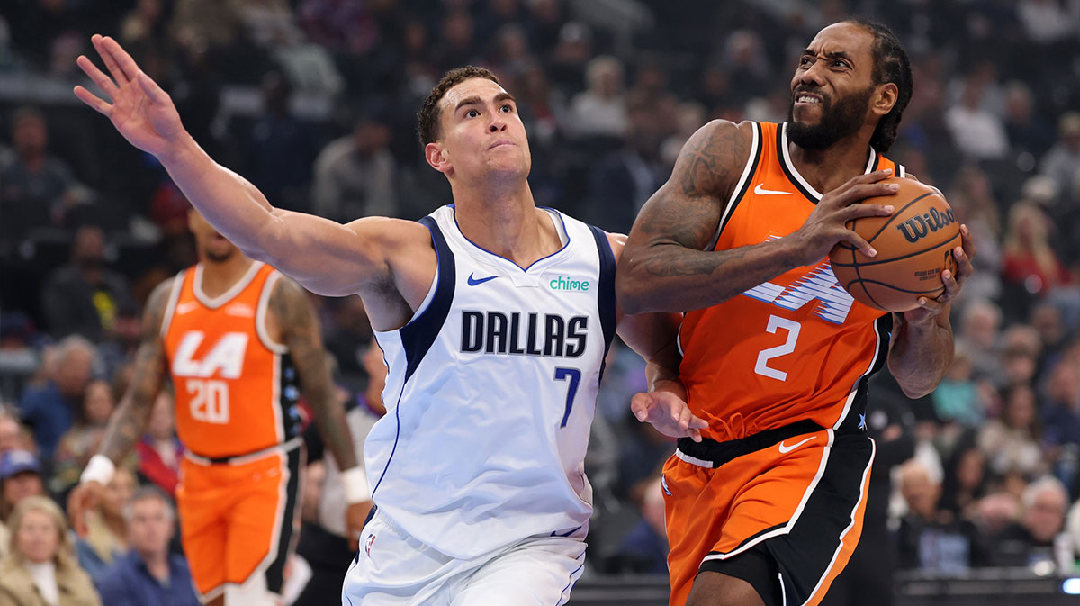 Los Angeles Clippers forward Kawhi Leonard (2) drives to the basket against Dallas Mavericks forward/center Dwight Powell (7) during the first quarter at Intuit Dome. 
