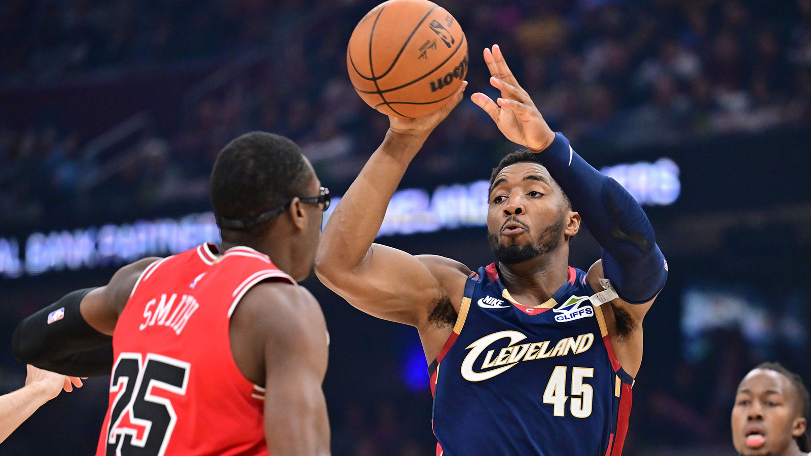 Cleveland Cavaliers guard Donovan Mitchell (45) passes as Chicago Bulls forward Jalen Smith (25) defends during the first half at Rocket Arena.