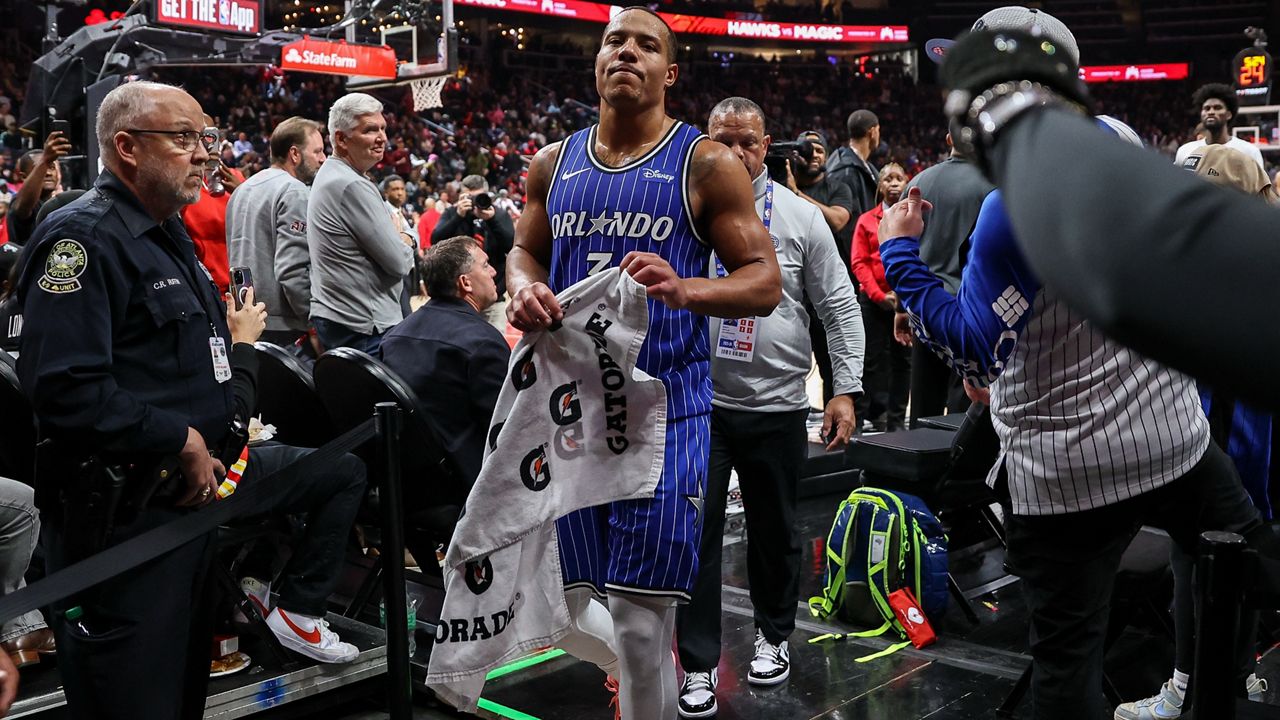 Orlando Magic guard Desmond Bane exits the court after getting ejected during the second half of an NBA basketball game against the Atlanta Hawks, Tuesday, Nov. 4, 2025, in Atlanta. (AP Photo/Colin Hubbard)