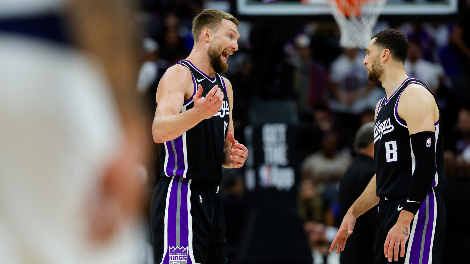 Sacramento Kings forward Domantas Sabonis (11) talks with guard Zach LaVine (8) during the second quarter against the Dallas Mavericks at Golden 1 Center.