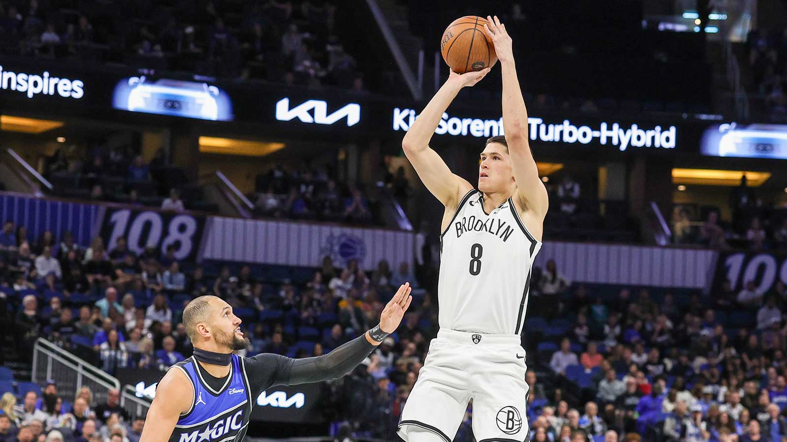 Brooklyn Nets guard Egor Demin (8) shoots against Orlando Magic guard Jalen Suggs (4) during the first quarter at Kia Center.
