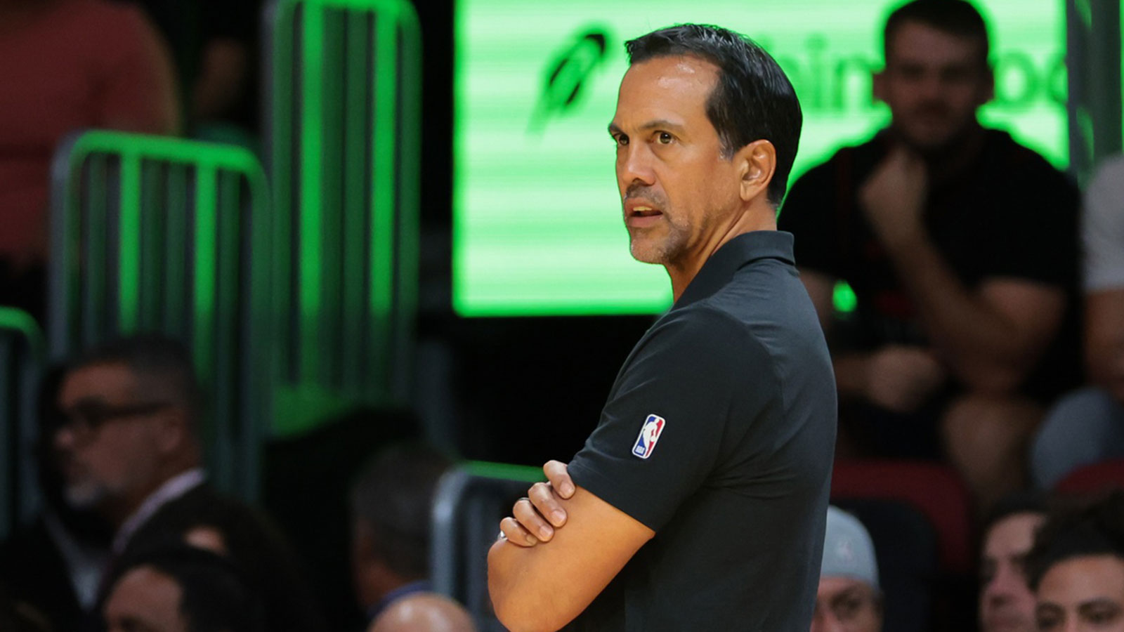 Miami Heat head coach Erik Spoelstra looks on from the sideline against the Charlotte Hornets during the first quarter of an NBA Cup game at Kaseya Center.