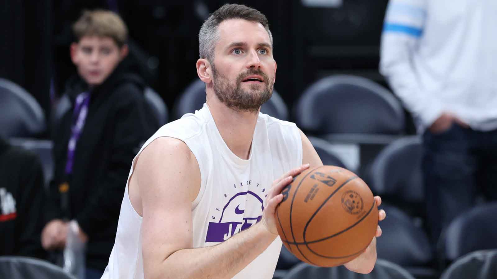 Jazz forward Kevin Love (42) warms up before the game against the Portland Trail Blazers at Delta Center