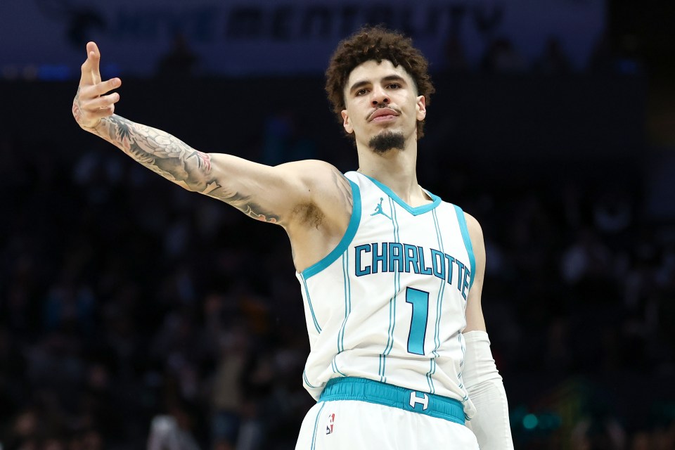 LaMelo Ball reacts following a three point basket during the second half of game against the Phoenix Suns at Spectrum Center on January 07, 2025 in Charlotte, North Carolina. NOTE TO USER: User expressly acknowledges and agrees that, by downloading and or using this photograph, User is consenting to the terms and conditions of the Getty Images License Agreement. (Photo by Jared C. Tilton/Getty Im