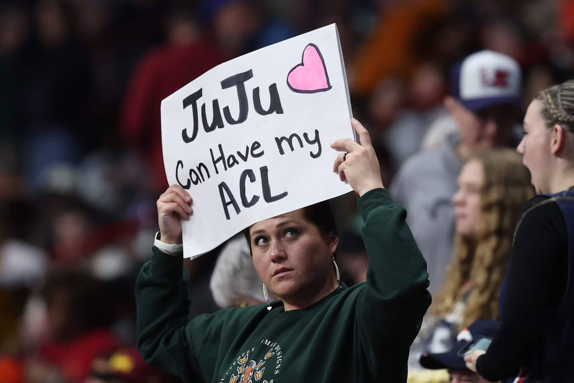 Fan displays sign in support of JuJu Watkins last season.