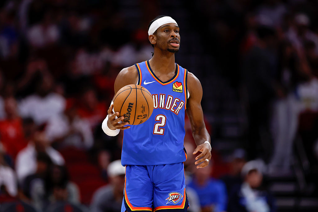 HOUSTON, TEXAS - APRIL 04: Shai Gilgeous-Alexander #2 of the Oklahoma City Thunder brings the ball up court in the first half against the Houston Rockets at Toyota Center on April 04, 2025 in Houston, Texas. NOTE TO USER: User expressly acknowledges and agrees that, by downloading and/or using this photograph, user is consenting to the terms and conditions of the Getty Images License Agreement. (Photo by Tim Warner/Getty Images)