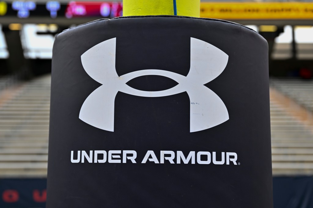 Under Armour logo on a black football goalpost padding.