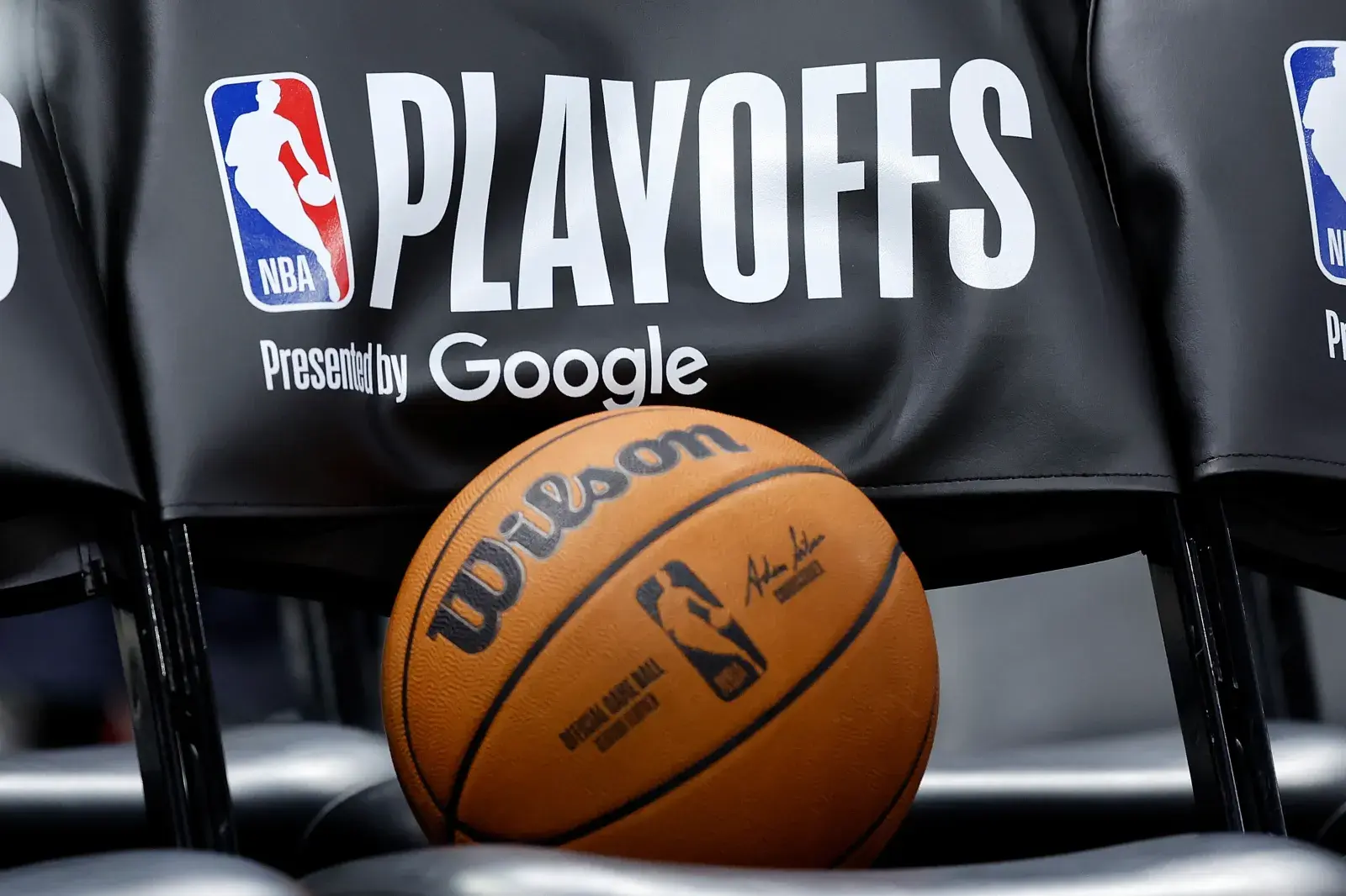 NBA playoffs logo and Wilson basketball