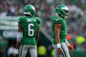 PHILADELPHIA, PENNSYLVANIA - OCTOBER 26: Jalen Hurts #1 and DeVonta Smith #6 of the Philadelphia Eagles look on against the New York Giants at Lincoln Financial Field on October 26, 2025 in Philadelphia, United States. (Photo by Mitchell Leff/Getty Images)