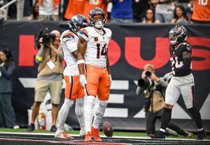 HOUSTON , TX - NOVEMBER 2: Courtland Sutton (14) of the Denver Broncos celebrates a touchdown pass from Bo Nix (10) during the second quarter against the Houston Texans at NRG Stadium in Houston, Texas on Sunday, November 2, 2025. (Photo by AAron Ontiveroz/The Denver Post)