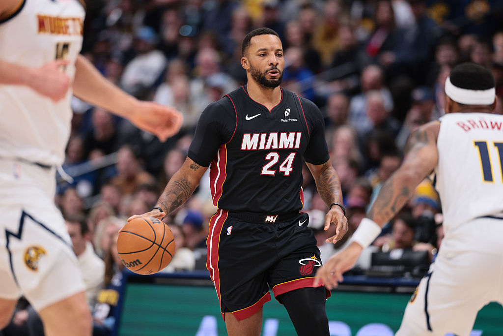 DENVER, COLORADO - NOVEMBER 05: Norman Powell #24 of the Miami Heat handles the ball against the Denver Nuggets during the second quarter at Ball Arena on November 5, 2025 in Denver, Colorado. NOTE TO USER: User expressly acknowledges and agrees that, by downloading and or using this photograph, User is consenting to the terms and conditions of the Getty Images License Agreement. (Photo by C. Morgan Engel/Getty Images)