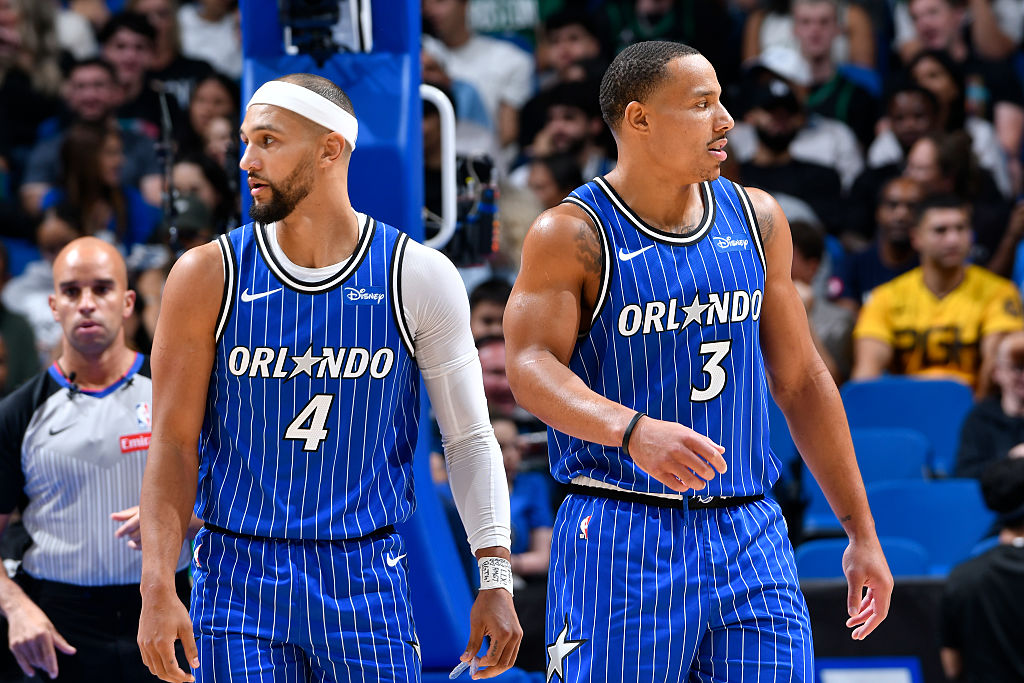 ORLANDO, FL - NOVEMBER 9: Jalen Suggs #4 and Desmond Bane #3 of the Orlando Magic during the game against the Boston Celtics on November 9, 2025 at Kia Center in Orlando, Florida.