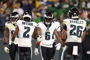 GREEN BAY, WISCONSIN - NOVEMBER 10: DeVonta Smith #6 of the Philadelphia Eagles celebrates with Jahan Dotson #2 and Saquon Barkley #26 after scoring a 36 yard touchdown against the Green Bay Packers during the fourth quarter in the game at Lambeau Field on November 10, 2025 in Green Bay, Wisconsin. (Photo by Michael Reaves/Getty Images)