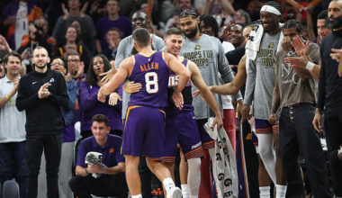 Grayson Allen #8 of the Phoenix Suns celebrates with Collin Gillespie #12 after hitting a three-poi...