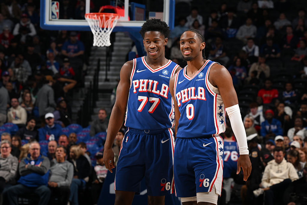 PHILADELPHIA, PA - NOVEMBER 17: VJ Edgecombe #77 and Tyrese Maxey #0 of the Philadelphia 76ers talk during the game against the LA Clippers on November 17, 2025 at the Wells Fargo Center in Philadelphia, Pennsylvania NOTE TO USER: User expressly acknowledges and agrees that, by downloading and/or using this Photograph, user is consenting to the terms and conditions of the Getty Images License Agreement. Mandatory Copyright Notice: Copyright 2025 NBAE (Photo by David Dow/NBAE via Getty Images)