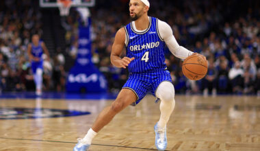 ORLANDO, FLORIDA - NOVEMBER 18: Jalen Suggs #4 of the Orlando Magic looks to pass in the first half during a game against the Golden State Warriors at Kia Center on November 18, 2025 in Orlando, Florida. NOTE TO USER: User expressly acknowledges and agrees that, by downloading and or using this photograph, User is consenting to the terms and conditions of the Getty Images License Agreement. (Photo by Mike Ehrmann/Getty Images)