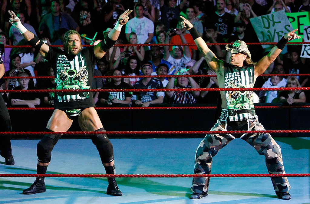 Shawn Michaels and Triple H do the DX crotch chop.
