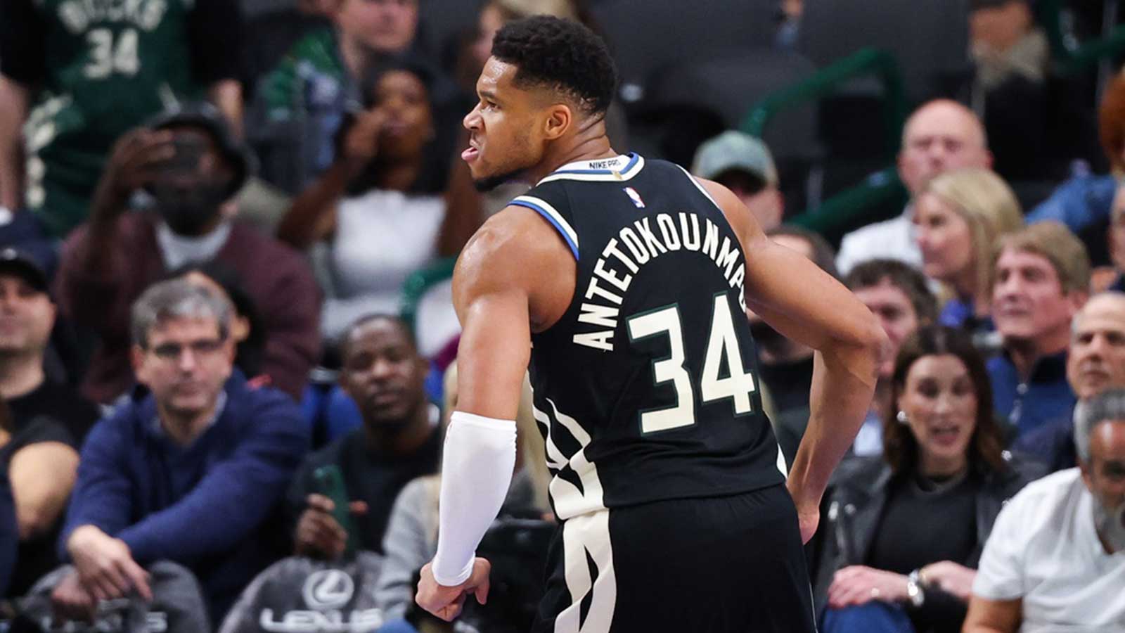 Milwaukee Bucks forward Giannis Antetokounmpo (34) reacts after scoring against the Dallas Mavericks during the fourth quarter at American Airlines Center.