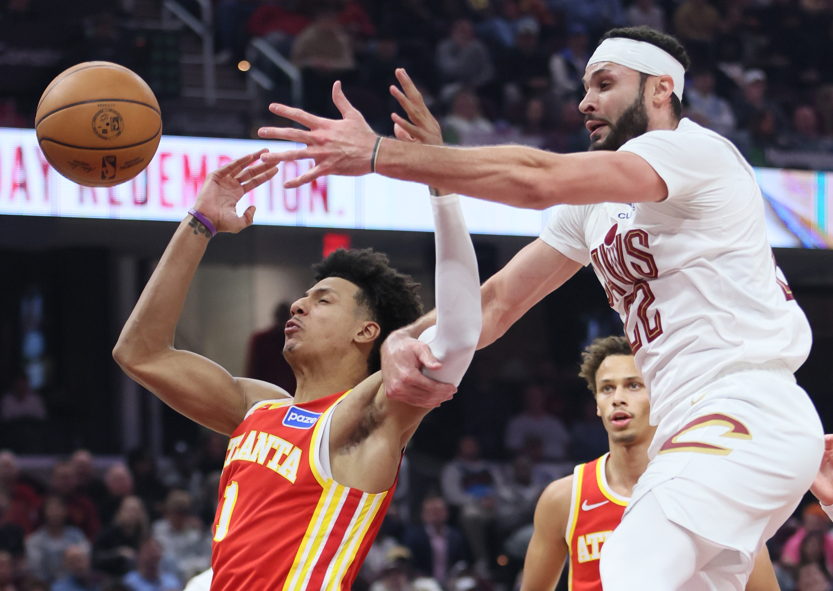 Cleveland Cavaliers forward Larry Nance Jr. (R) and Atlanta Hawks forward Jalen Johnson battle for a rebound in the first half at Rocket Arena. 
