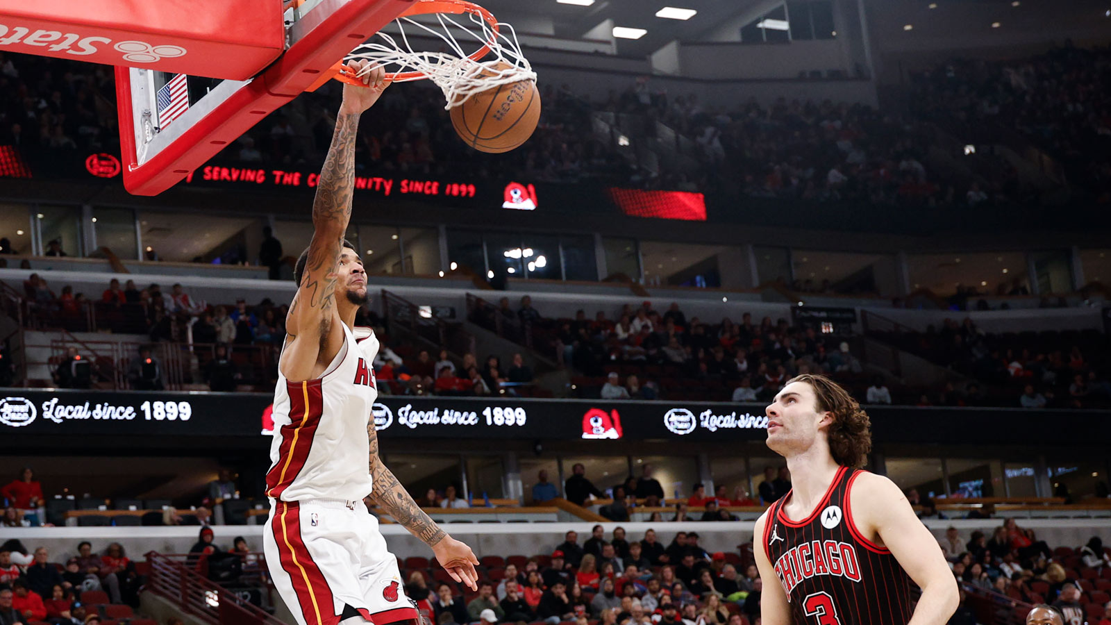 Heat center Kel'el Ware (7) scores against the Chicago Bulls during the second half at United Center